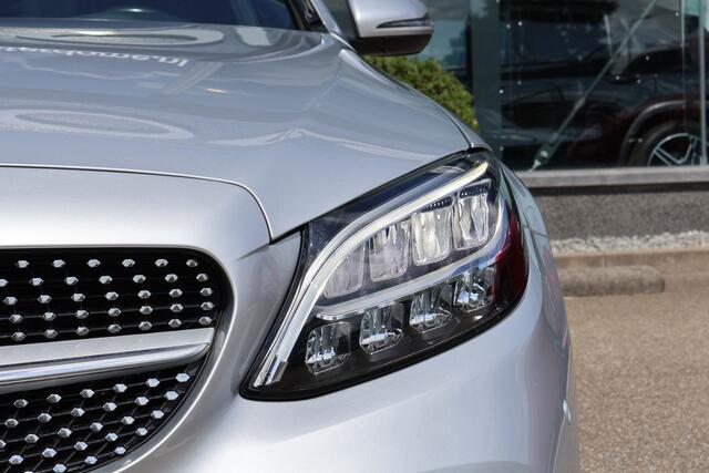 Mercedes-Benz C-KLASSE 180 Business Solution AMG I Camera I Tempomaat I Stoelverwarming I Virtual dashbord I Led I Automaat I I Essenhout I Parkeersensoren I Nederlandse auto I