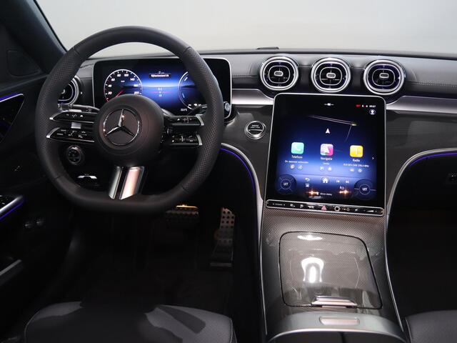 Mercedes-Benz C-KLASSE 300e Business Solution AMG | Panoramaschuifdak | Nightpakket | Digital Light | 19" LM velgen | Dodehoekassistent | 360° camera | Stoelverwarming | Sfeerverlichting |
