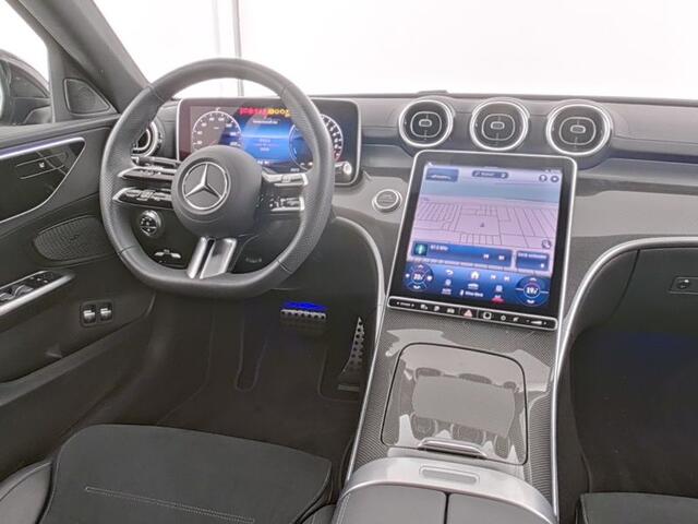 Mercedes-Benz C-KLASSE 300 e AMG Plug-In Hybride AMG Line | Night Pakket | Achteruitrijcamera | Dodehoek Assist | AMG Spoiler | Stuur en Stoelverwarming. Inclusief 24 maanden Mercedes-Benz Certified garantie voor Europa.