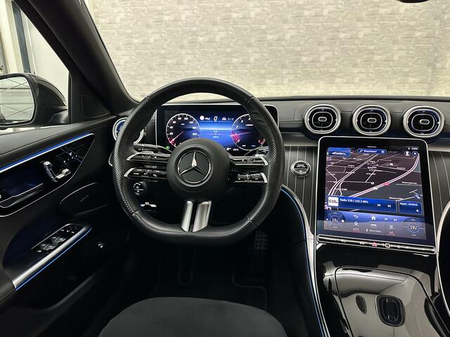 Mercedes-Benz C-KLASSE 300 Benzine 4MATIC AMG-Line | 360 Camera | Panorama | ACC | 19'' | Digital-LED | Night-Pakket | Nw.pr; 100758,= | Memory | Trekhaak | Sfeerverlichting | Rij-Assistent Plus | Parfumering | Autom. Parkeren | Carplay | Draadloos Laden.