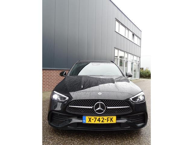 Mercedes-Benz C-KLASSE Estate 200 d AMG Line DODEHOEK DETECTIE | NAVIGATIE| CRUISE CONTROL | CAMERA | SFEERVERLICHTING | PANORAMADAK | ELEKTRISCHE STOELEN | STOELVERWARMING |
