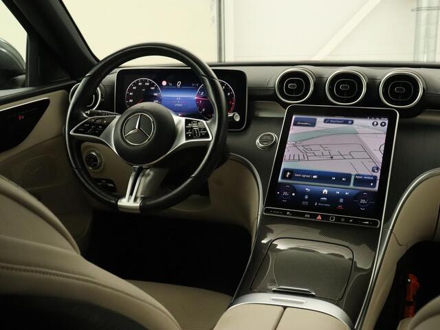 Mercedes-Benz C-KLASSE 200 Launch Edition Luxury Line | Panoramadak | Trekhaak | Leder | Stoelverwarming | Carplay | Camera | Sfeerverlichting | Navigatie | 18'' | Getint glas