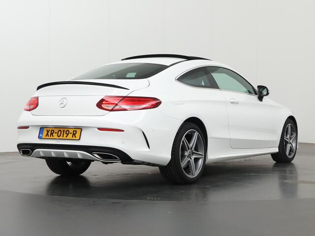 Mercedes-Benz C-KLASSE Coupé 180 Premium Plus | AMG | Panoramadak | Memory | Sfeerverlichting | Stoelverwarming |