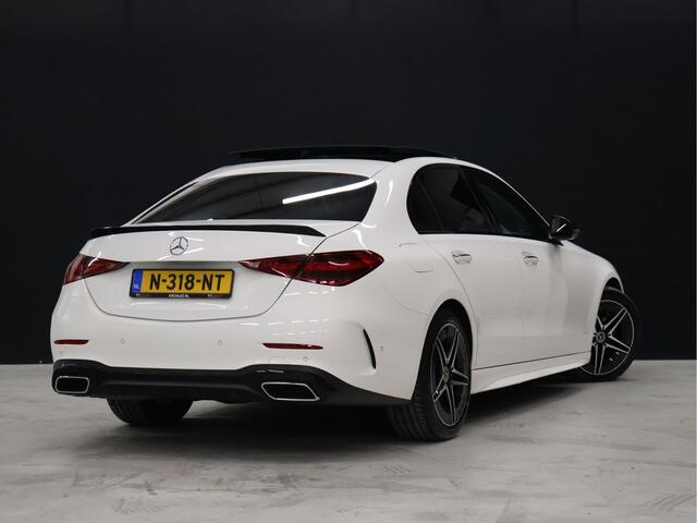 Mercedes-Benz C-KLASSE 200 4MATIC AMG Line [SCHUIFKANTELDAK, ADAPTIVE CRUISE CONTROL, BURMESTER, ELEKTRISCHE STOELEN, 360 CAMERA, SFEERLICHT, CARBON, URBAN GUARD+, NIEUWSTAAT]