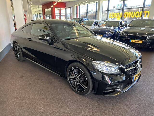 Mercedes-Benz C-KLASSE Coupé 300 Premium Plus Pack AMG 260PK Facelift | Dealer onderhouden | Cruise control | Climate control | Sfeerverlichting | Achteruitrijcamera | Adaptief onderstel | Stoelverwarming | Lane assist | Dodehoeksdetectie