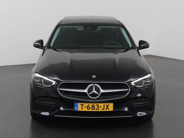 Mercedes-Benz C-KLASSE 180 AMG Line | Panoramadak | 360 camera | Draadloos laden |