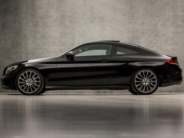 Mercedes-Benz C-KLASSE Coupé 180 AMG Sport 157Pk Automaat (SCHUIFDAK, NAVIGATIE, STOELVERWARMING, LEDER/ALCANTARA, ZWART HEMEL, SPORTSTOELEN, FLIPPERS, LED KOPLAMPEN, NIEUWE APK, NIEUWSTAAT)