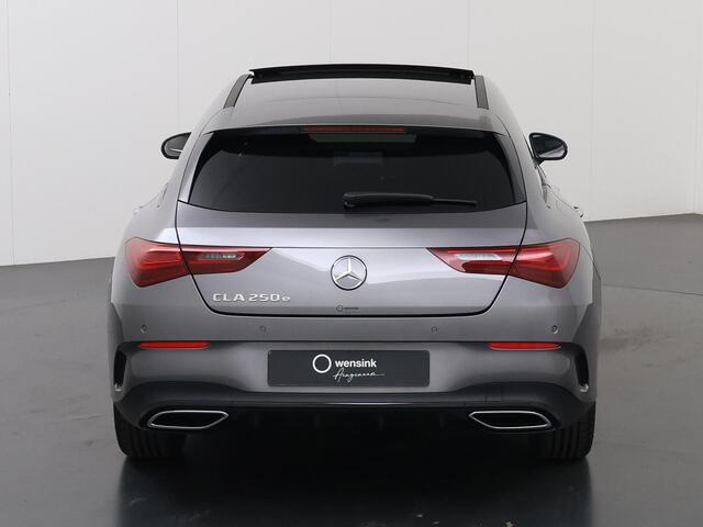 Mercedes-Benz CLA-KLASSE 250e Shooting Brake Business Solution AMG | Panoramaschuifdak | Nightpakket | 19 inch AMG-velgen| Verwarmde stoelen | Sfeerverlichting | LED koplampen |