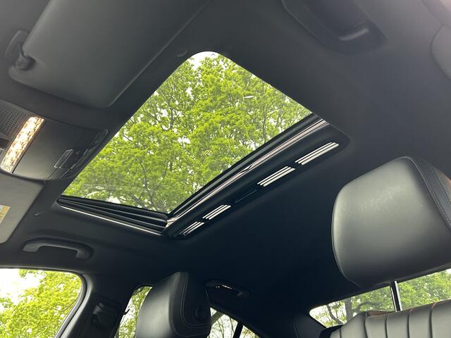 Mercedes-Benz CLS-KLASSE 450 4Matic AMG // Burmester // 360 Camera // Sunroof // Trekhaak // 20 inch // Designo White // Distronic