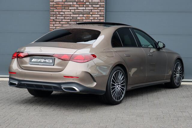 Mercedes-Benz E-KLASSE 300 e AMG Line | Hyperscreen | Airmatic | Achterasbesturing | Distronic+ | Stoelventilatie | Memory | Burmester | HUD | Digital Light | Surround Camera | Verwarmd Stuurwiel |