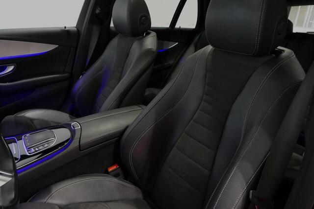 Mercedes-Benz E-estate 300 e AMG Line / E63 AMG Grill / E63 AMG Diffuser / Panoramadak / Burmester Sound System / Sfeerverlichting / Luchtvering (achteras) / LED High Performance / 20'' LMV / Night pakket / Apple Carplay - Andriod auto / Stoelverwarming / Trekhaak (zwenkbaar) /