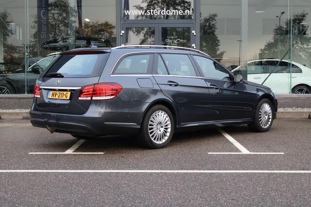 Mercedes-Benz E-estate 200 Ambition Elegance l Airconditoning l Afneembare trekhaak l LED adaptief l Stoelverwarming l Spiegelpakket l Tempomaat l Parkeersensoren l Alarm klasse 3 SCM l Radio Audio 20 APS l