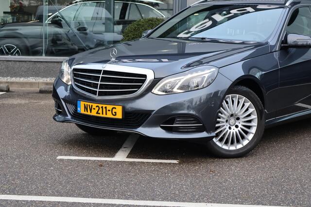 Mercedes-Benz E-estate 200 Ambition Elegance l Airconditoning l Afneembare trekhaak l LED adaptief l Stoelverwarming l Spiegelpakket l Tempomaat l Parkeersensoren l Alarm klasse 3 SCM l Radio Audio 20 APS l