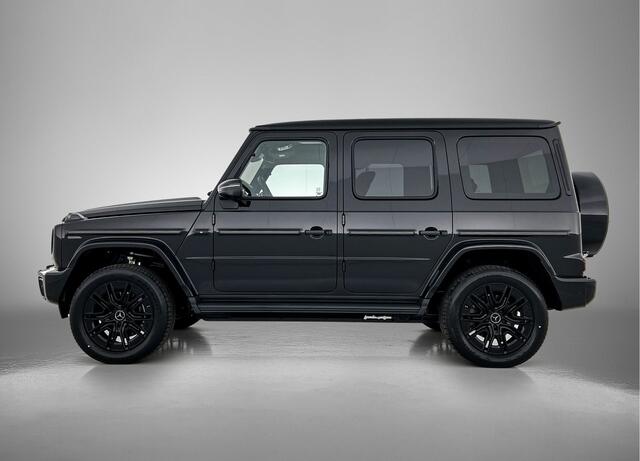 Mercedes-Benz G-KLASSE 580 met EQ-Technologie 116 kWh | SUPERIOR Line interieur | Comfortpakket | Radiatorgrille Black Panel | Nightpakket | Treeplanken | Logopakket in mat zwart | Zwart essenhout |