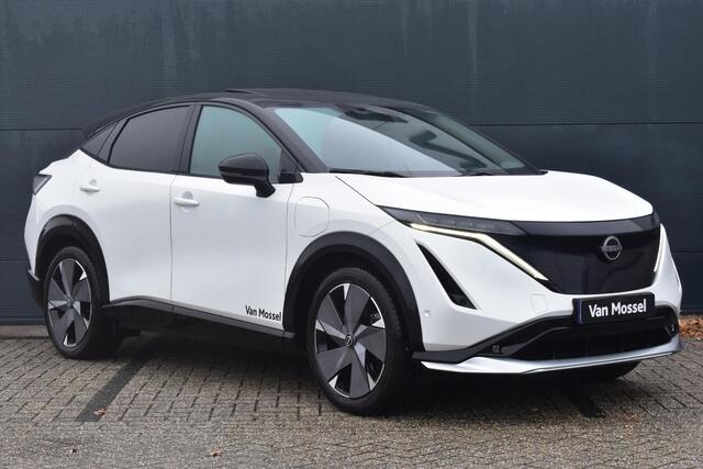 Nissan Ariya e-4ORCE Evolve+ 91 kWh 400pk | Schuif/kanteldak | Leder | Draadloze Apple Carplay & Android Auto | Elektrisch Verstelbare Stoelen | Stoel/Stuurwiel Verwarming | Voorspoiler |