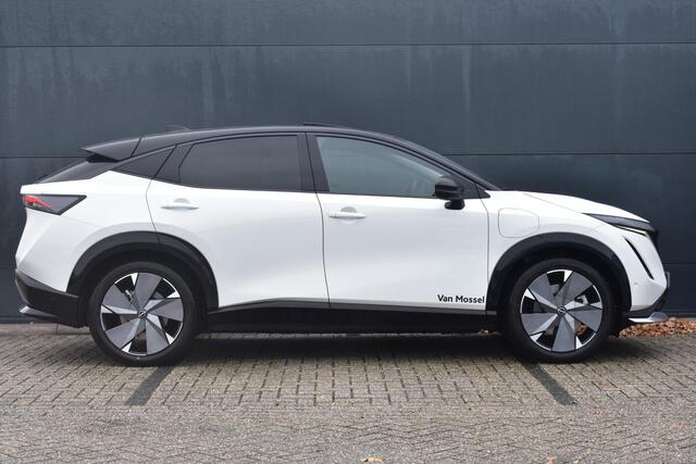 Nissan Ariya e-4ORCE Evolve+ 91 kWh 400pk | Schuif/kanteldak | Leder | Draadloze Apple Carplay & Android Auto | Elektrisch Verstelbare Stoelen | Stoel/Stuurwiel Verwarming | Voorspoiler |