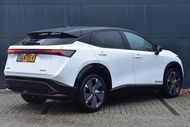 Nissan Ariya e-4ORCE Evolve+ 91 kWh 400pk | Schuif/kanteldak | Leder | Draadloze Apple Carplay & Android Auto | Elektrisch Verstelbare Stoelen | Stoel/Stuurwiel Verwarming | Voorspoiler |