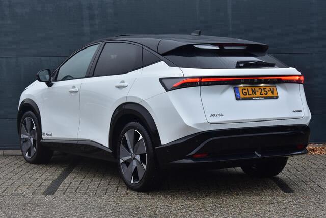 Nissan Ariya e-4ORCE Evolve+ 91 kWh 400pk | Schuif/kanteldak | Leder | Draadloze Apple Carplay & Android Auto | Elektrisch Verstelbare Stoelen | Stoel/Stuurwiel Verwarming | Voorspoiler |