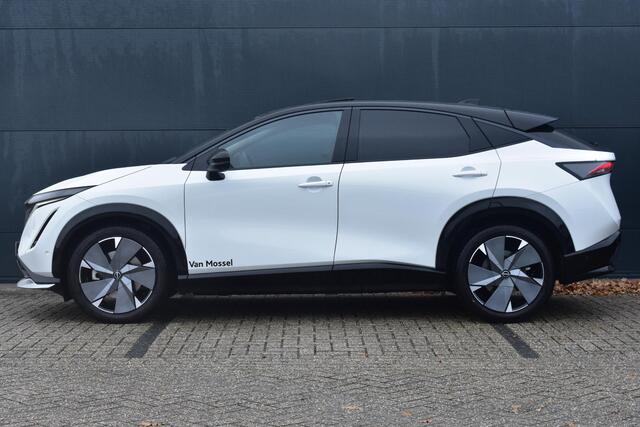 Nissan Ariya e-4ORCE Evolve+ 91 kWh 400pk | Schuif/kanteldak | Leder | Draadloze Apple Carplay & Android Auto | Elektrisch Verstelbare Stoelen | Stoel/Stuurwiel Verwarming | Voorspoiler |