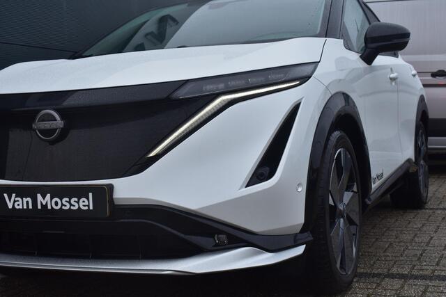Nissan Ariya e-4ORCE Evolve+ 91 kWh 400pk | Schuif/kanteldak | Leder | Draadloze Apple Carplay & Android Auto | Elektrisch Verstelbare Stoelen | Stoel/Stuurwiel Verwarming | Voorspoiler |