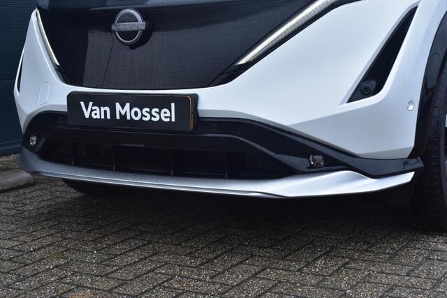 Nissan Ariya e-4ORCE Evolve+ 91 kWh 400pk | Schuif/kanteldak | Leder | Draadloze Apple Carplay & Android Auto | Elektrisch Verstelbare Stoelen | Stoel/Stuurwiel Verwarming | Voorspoiler |