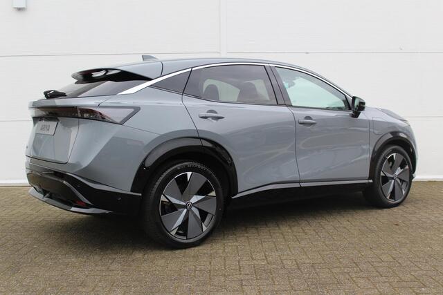 Nissan Ariya Evolve 91 kWh / ¤3.000,- Nissan Voorraadvoordeel / Nieuw uit Voorraad Leverbaar/ 20 Inch Velgen / Schuif/Kanteldak / Navigatie / 360 Graden Camera /