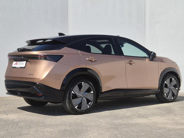 Nissan Ariya e-4ORCE Evolve+ Pack 91 kWh Automaat / Vision Tech / HUD / Trekgewicht 1500 kg / Glazen schuif- en kanteldak / Bose Audio Systeem / Stuur-, Stoel en Achterbankverwarming / Rondomzicht camera / Elektrische achterklep /