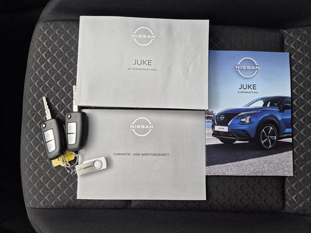 Nissan JUKE 1.0 DIG-T Acenta / Nissan Connect Navigatie / Stoelverwarming / Cruise control / Achteruitrijcamera / Apple Carplay Android Auto / Climate control / Allseason Banden /