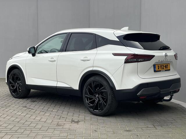 Nissan QASHQAI 1.3 MHEV Xtronic Tekna Plus / Vaste Trekhaak 13-polig (Trekgewicht 1.800kg) / All Seasons / Panoramadak / HUD / Apple Carplay & Android Auto / Keyless Entry & Start / Elektrische Achterklep / Adaptieve Cruise Control / Navigatie full map / Elektrisch Vers