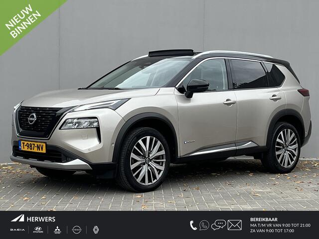 Nissan X-TRAIL 1.5 e-4orce Tekna Plus 4WD / Glazen Schuif- en Kanteldak / 360° Camera / HUD / 1800kg trekken / Apple Carplay & Android Auto / Elektrisch Verstelbare Voorstoelen met geheugenset / Elektrische Achterklep / Stuur- en Stoelverwarming / Voorruitverwarming /