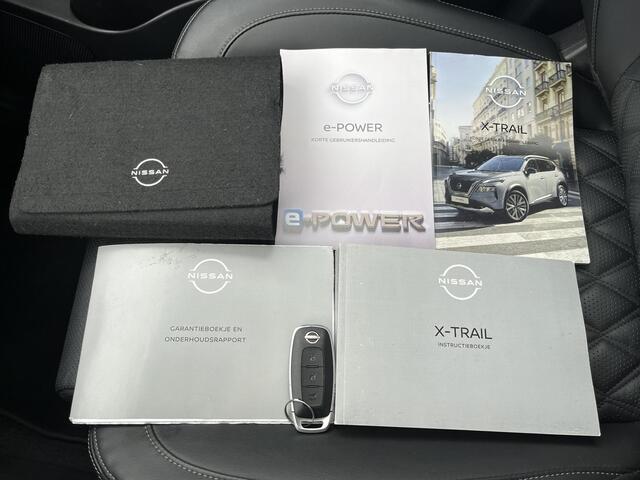 Nissan X-TRAIL 1.5 e-4orce Tekna Plus 4WD / Glazen Schuif- en Kanteldak / 360° Camera / HUD / 1800kg trekken / Apple Carplay & Android Auto / Elektrisch Verstelbare Voorstoelen met geheugenset / Elektrische Achterklep / Stuur- en Stoelverwarming / Voorruitverwarming /