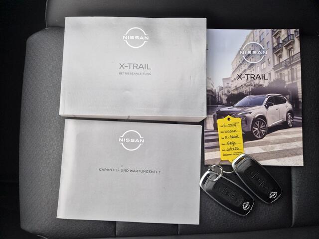 Nissan X-TRAIL 1.5 e-4orce Tekna 4WD Automaat / Fabrieksgarantie tot 06-2027 / Dealer onderhouden / Allseason banden / Trekgewicht 1800 kg / HUD / Elektrische achterklep / Stuur-, Stoel en Achterbank verwarming / Adaptief CC / Voorruit verwarming /