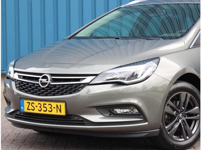 Opel ASTRA Sports Tourer 1.4 150PK Turbo 120 Jaar Edition | AppleCarPlay/AndroidAuto | Climate Control | Navigatie | Armsteun | Cruise Control | Trekhaak | Parkeersensoren | Privacy Glass | Isofix |