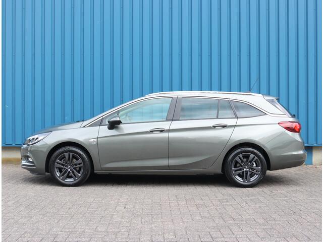 Opel ASTRA Sports Tourer 1.4 150PK Turbo 120 Jaar Edition | AppleCarPlay/AndroidAuto | Climate Control | Navigatie | Armsteun | Cruise Control | Trekhaak | Parkeersensoren | Privacy Glass | Isofix |
