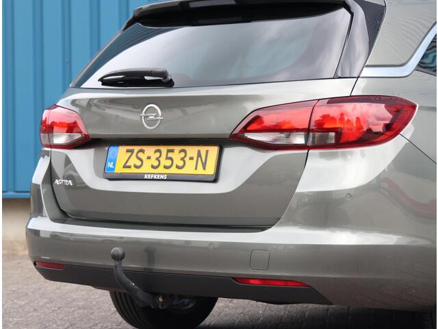 Opel ASTRA Sports Tourer 1.4 150PK Turbo 120 Jaar Edition | AppleCarPlay/AndroidAuto | Climate Control | Navigatie | Armsteun | Cruise Control | Trekhaak | Parkeersensoren | Privacy Glass | Isofix |