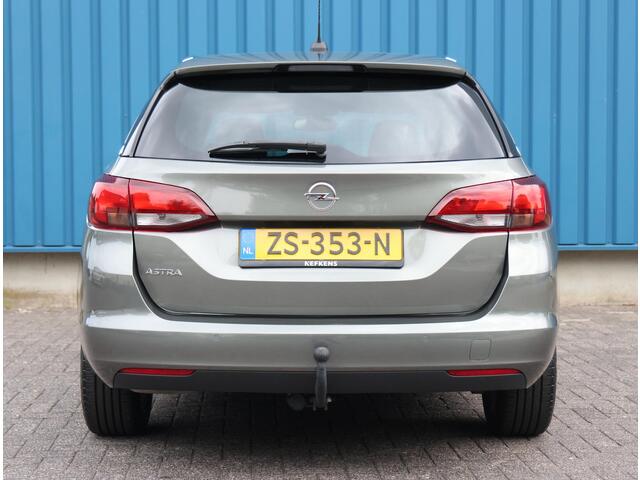 Opel ASTRA Sports Tourer 1.4 150PK Turbo 120 Jaar Edition | AppleCarPlay/AndroidAuto | Climate Control | Navigatie | Armsteun | Cruise Control | Trekhaak | Parkeersensoren | Privacy Glass | Isofix |