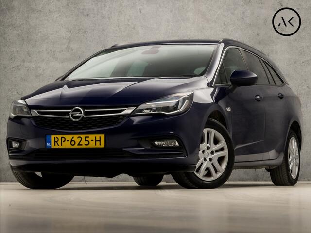 Opel ASTRA Sports Tourer 1.4 Turbo Sport 150Pk (4 CILINDER, APPLE CARPLAY, GROOT NAVI, GETINT GLAS, CRUISE, SPORTSTOELEN, ARMSTEUN, TREKHAAK, NIEUWSTAAT)