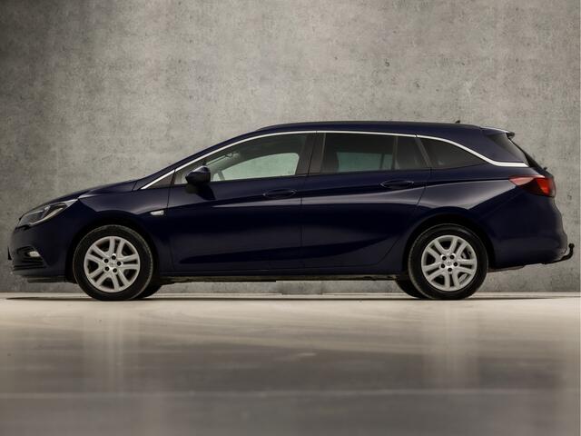 Opel ASTRA Sports Tourer 1.4 Turbo Sport 150Pk (4 CILINDER, APPLE CARPLAY, GROOT NAVI, GETINT GLAS, CRUISE, SPORTSTOELEN, ARMSTEUN, TREKHAAK, NIEUWSTAAT)