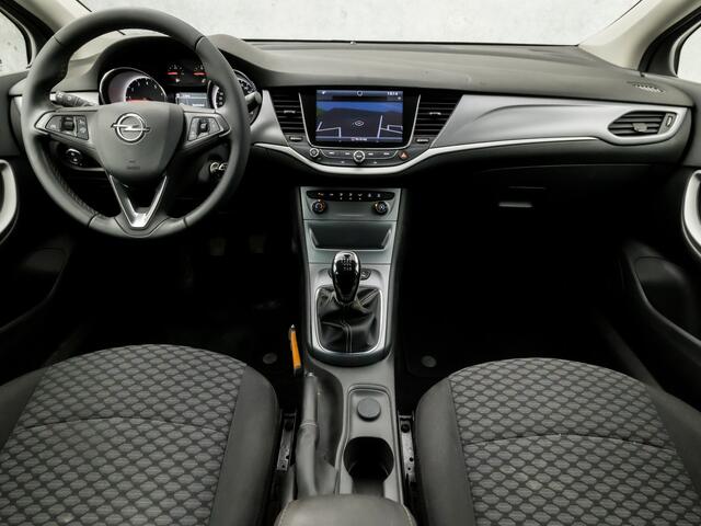Opel ASTRA Sports Tourer 1.4 Turbo Sport 150Pk (4 CILINDER, APPLE CARPLAY, GROOT NAVI, GETINT GLAS, CRUISE, SPORTSTOELEN, ARMSTEUN, TREKHAAK, NIEUWSTAAT)
