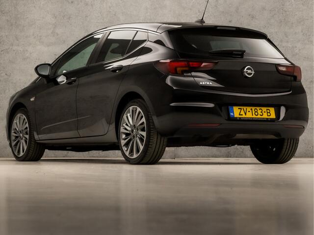 Opel ASTRA 1.0 Turbo Sport (APPLE CARPLAY, NAVIGATIE, GETINT GLAS, LM VELGEN, SPORTSTOELEN, PARKEERSENSOREN, LM VELGEN, CRUISE, NIEUWE APK, NIEUWSTAAT)