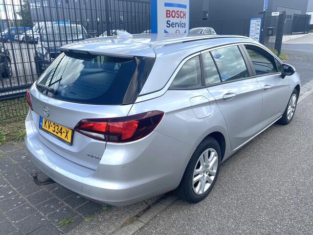Opel ASTRA Sports Tourer 1.4 Edition 12-2016! met o.a. trekhaak, navigatie, cruise control, chroom pack, etc.