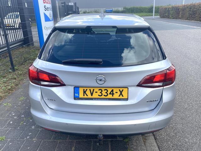 Opel ASTRA Sports Tourer 1.4 Edition 12-2016! met o.a. trekhaak, navigatie, cruise control, chroom pack, etc.