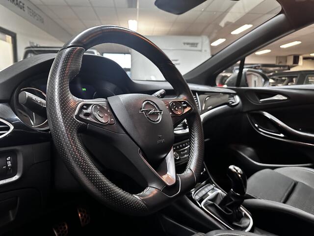 Opel ASTRA Sports Tourer 1.2 Elegance/ Trekhaak!/ LED Koplampen/ Virtual Cockpit/ Dodehoekdetectie/ Camera/ Zwarte Hemel/ Grootlichtass./ Keyless/ DAB+/ Apple+Android/ Clima/ Navi/ Cruise/ Bluetooth/ Multi.LEDER.Stuur/ Elek.Pakket