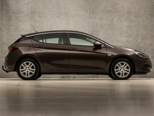 Opel ASTRA 1.4 Turbo Sport 150Pk Automaat (APPLE CARPLAY, GROOT NAVI, CLIMATE, LM VELGEN, SPORTSTOELEN, TREKHAAK, PARKEERSENSOREN, NIEUWE APK, NIEUWSTAAT)