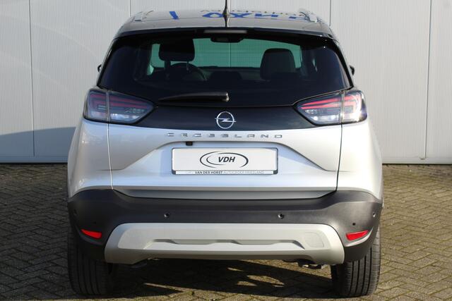Opel Crossland 1.2-110pk Turbo 'Elegance'. Mooie en luxe hoogzitter met weinig km's ! Volautm. airco dual, cruise control, camera, comfortstoelen, metallic lak, LM wielen, navigatie, telefoonvoorb., lane- en side assist, parkeersensoren v+a, LED verlichting etc.
