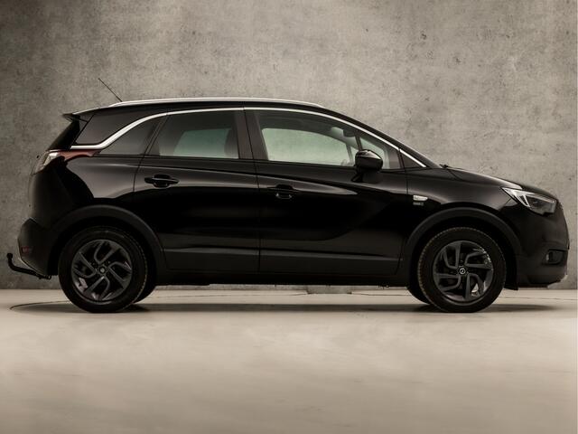 Opel Crossland X 1.2 Black Sport (APPLE CARPLAY, GROOT NAVI, 360 CAMERA, TREKHAAK, CLIMATE, SPORTSTOELEN, LM VELGEN, GETINT GLAS, CRUISE, DAB+, LED KOPLAMPEN, NIEUWSTAAT)