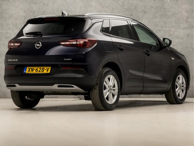 Opel Grandland X 1.2 Turbo Sport (APPLE CARPLAY, GROOT NAVI, LEDER, CAMERA, STUUR/STOELVERWARMING, SPORTSTOELEN, KEYLESS, CRUISE, GETINT GLAS, NIEUWSTAAT)