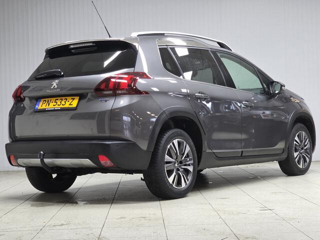 Peugeot 2008 1.2 PureTech Allure/ D-Riem verv: 64.000 KM!/ AUTOMAAT!/ Trekhaak/ Half-Leder/ Panorama-Dak/ Apple + Android/ DAB+/ Navi/ Clima/ Cruise/ Bluetooth/ Multi. LEDER. Stuur/ 16'' LMV/ Mistl./ PDC/ Extra getint Glas/ D