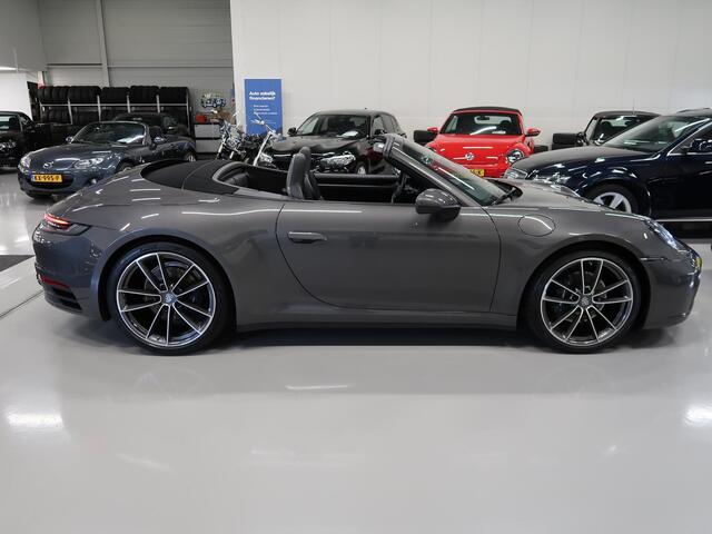 Porsche 911 Cabrio 3.0 Carrera 992 Bose 360 Camera Sportuitlaat PASM Sport-Chrono 21 inch Approved garantie 10/2026 4 Nieuwe banden Groot onderhoud gehad PPF folie NIEUWSTAAT Flippers Stoelverkoeling LED PDLS