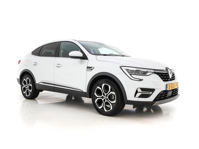 Renault Arkana 1.6 E-Tech hybrid 145 techno (INCL.BTW) *1/2LEATHER | FULL-LED | DIGI-COCKPIT | BLIND-SPOT | NAVI-FULLMAP | AMBIENT-LIGHT | CAMERA | KEYLESS | DAB+ | COMFORT-SEATS | 18''ALU*